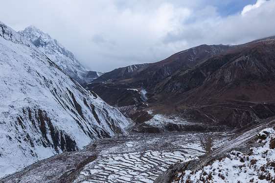 The trail to Dharamsala (Larkye Phedi) seen from a ridge above Samdo village