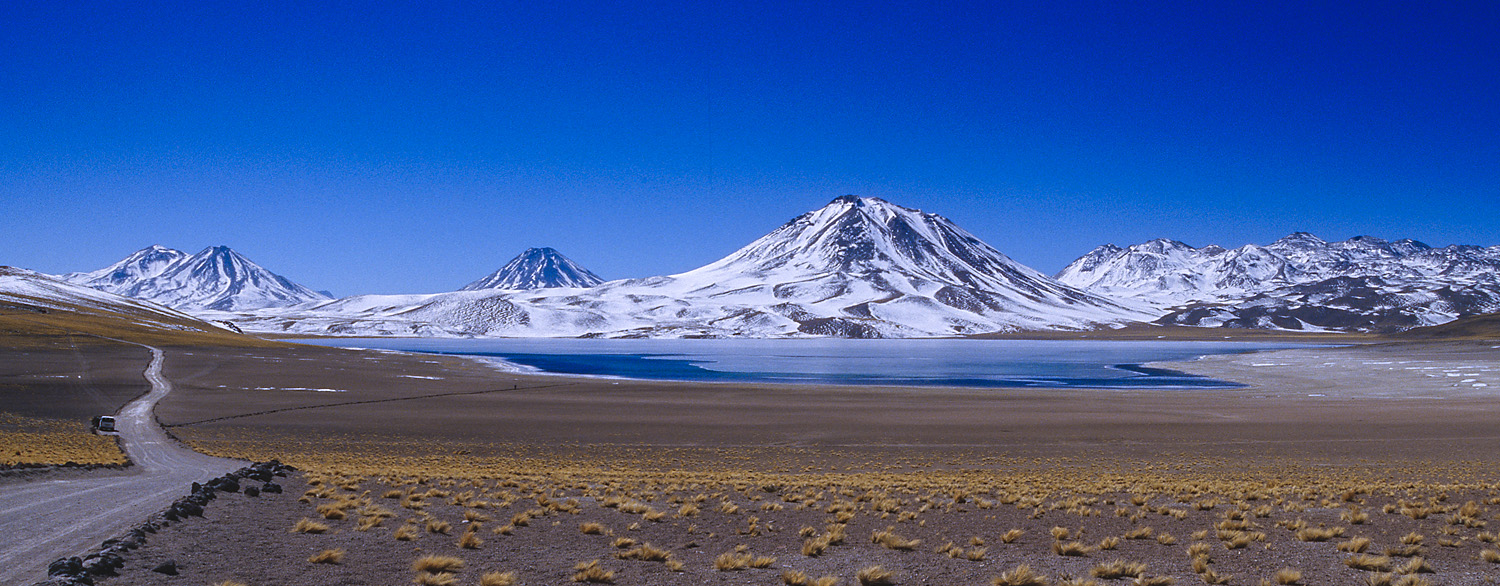 Volcano Chiliques and Cerro Miscanti seen from the Laguna Miscanti, Atacama Desert, Chile