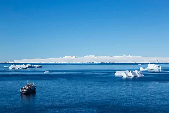 Anchoring Plancius with icebergs, Brown Bluff, Tabarin Peninsula