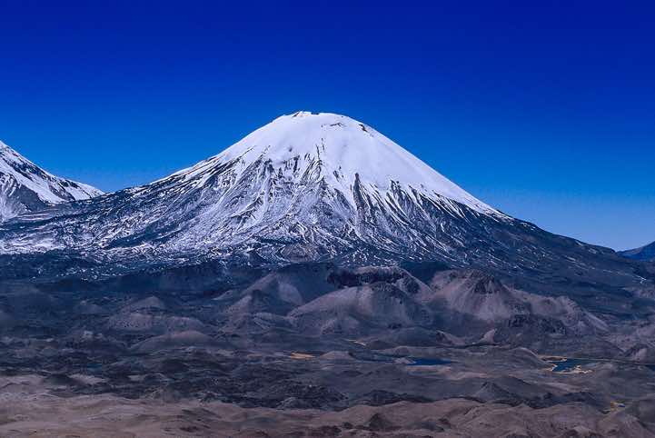 Parinacota volcano, 6348m, seen from the top of Guane Guane, 5097m