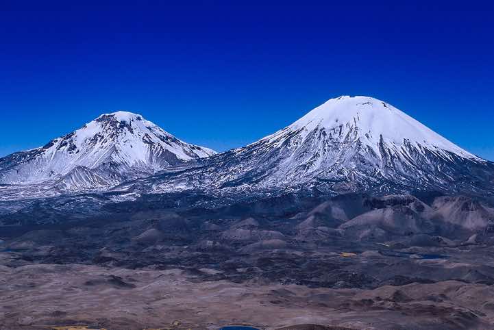 Pomerape, 6232m, and Parinacota, 6348m, seen from the top of Guane Guane, 5097m