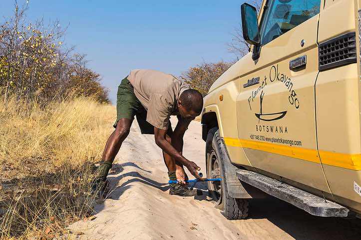 Inspecting a flat tyre