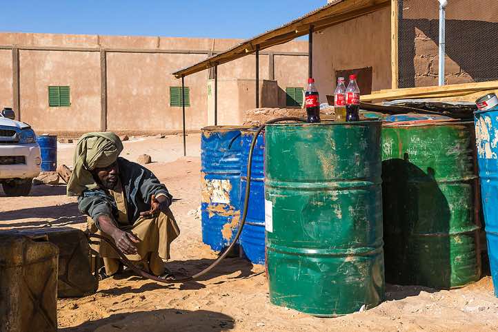 Driver Mohammed at a gas station in the desert