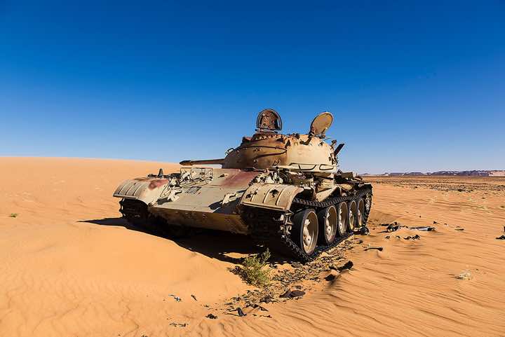 The remnants of a Libyan tank in the desert sand