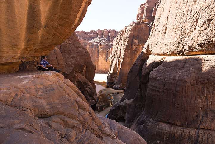 The photographer taking a break at Guelta d'Archei, Ennedi Mountains, northeastern Chad