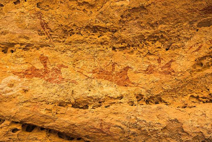 Rock painting of galloping horses and riders, Terkei Cave, Ennedi, northeastern Chad