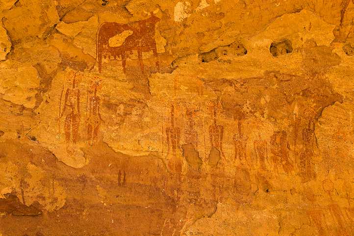 Rock art panel of human figures with large decorated hairstyles and domesticated animals, Terkei West, Ennedi, northeastern Chad