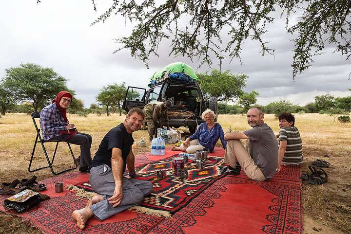 Lunch time in the shadow of a tree. From left: Halima, Johann, Omar, Martina, Michael and Tatjana
