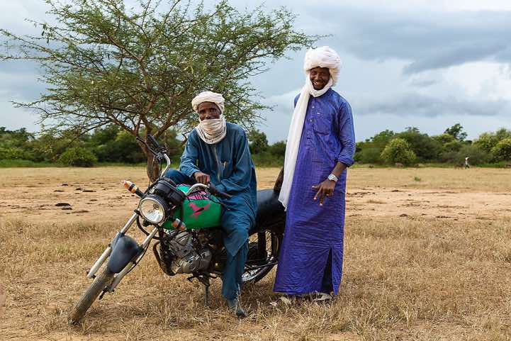 Men with motorcycle at the Gerewol festival