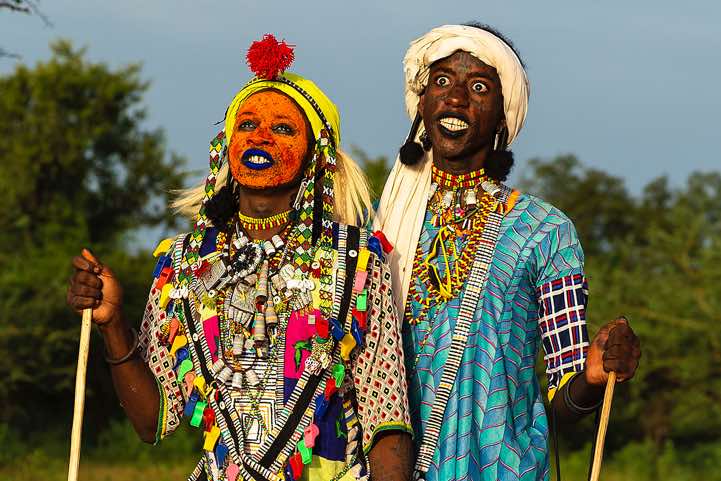 Many Wodaabe (Bororo) men paint their lips black to emphasize their white teeth, Gerewol festival