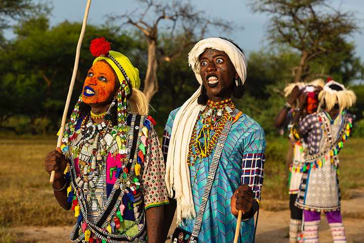 Wodaabe (Bororo) men roll their eyes and show their teeth at the Gerewol festival