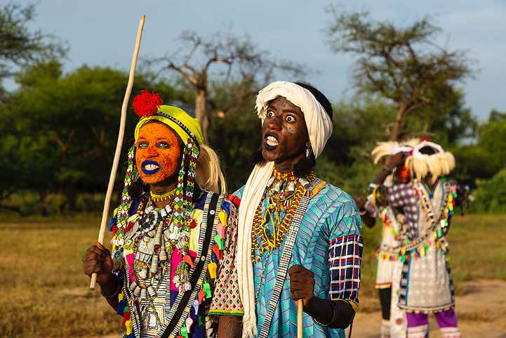 Wodaabe (Bororo) men roll their eyes and show their teeth at the Gerewol festival