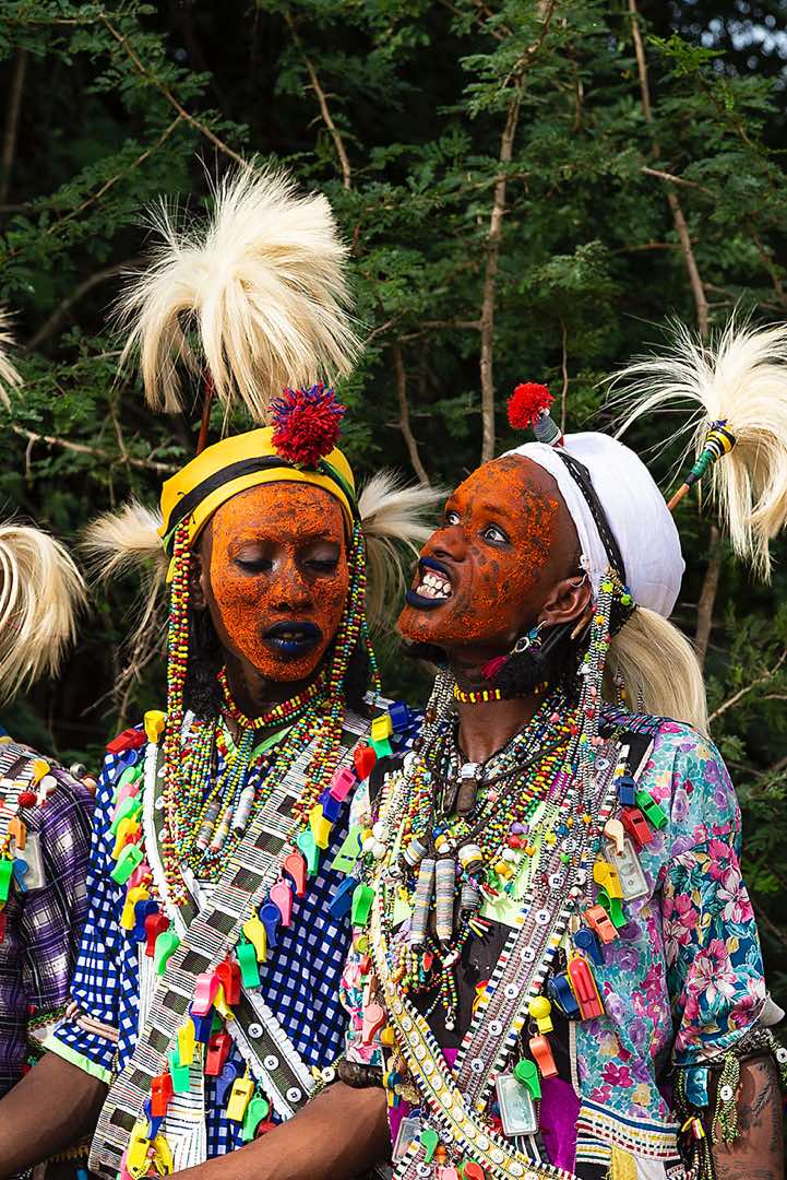 Wodaabe (Bororo) men at the Gerewol festival wearing elaborate makeup and clothing