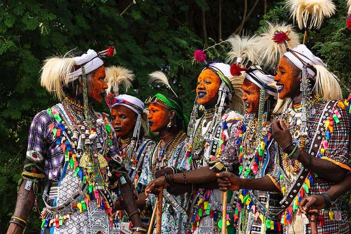Wodaabe (Bororo) men chanting and dancing at the Gerewol festival