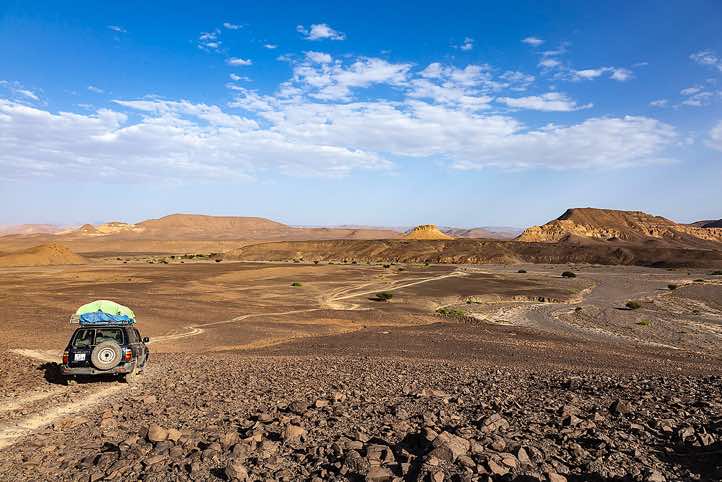 Driving through barren, but grandiose landscape on a appallingly bad road, Tibesti region