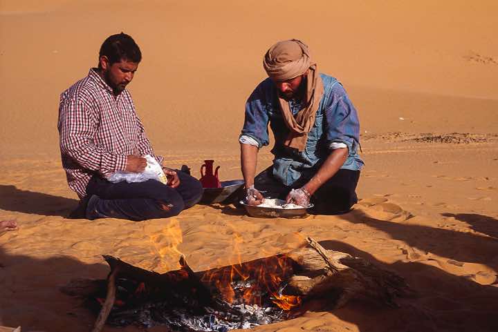 Baking bread for dinner at our camp site in the Ubari Sand Sea (Edeyen Ubari)