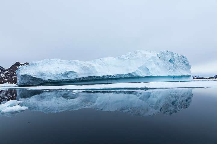 Iceberg reflecting in water, Ammassalik Island