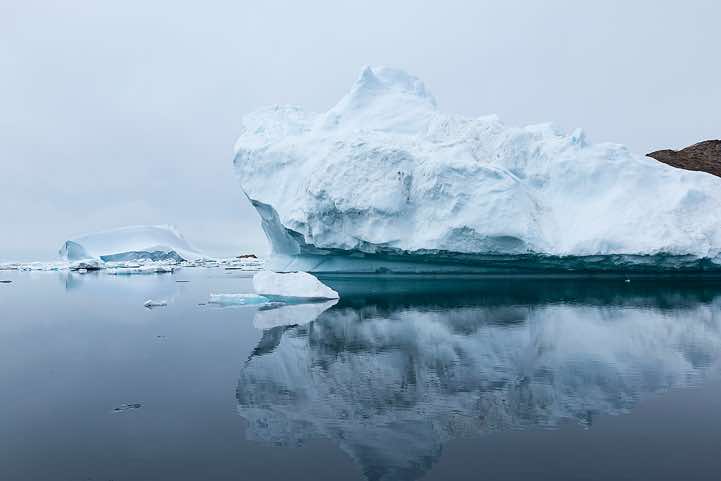 Iceberg reflecting in water, Ammassalik Island
