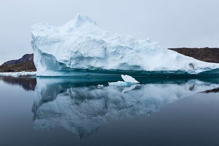 Iceberg reflecting in water, Ammassalik Island