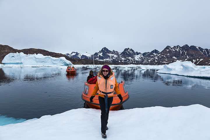 Daniela stepping on an ice floe, Ammassalik Island