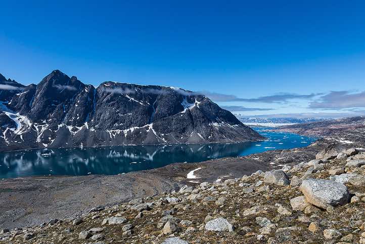 View of Ikaasartivaq Strait, Sermilik Fjord is visible in the distance