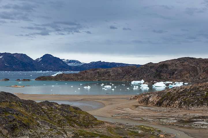 Coastline and floating icebergs near Sermilik Research Station, Sermilik Fjord, Ammassalik Island