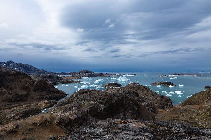 Coastline and floating icebergs near Sermilik Research Station, Sermilik Fjord, Ammassalik Island