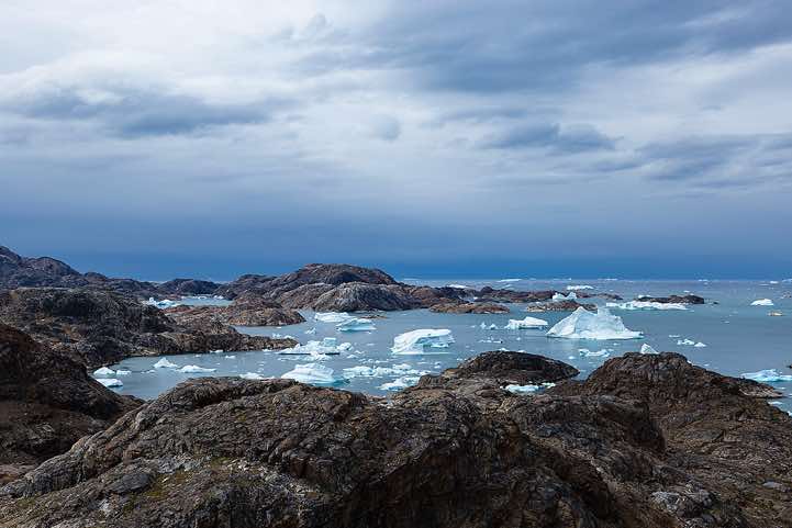 Coastline and floating icebergs near Sermilik Research Station, Sermilik Fjord, Ammassalik Island