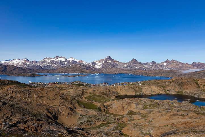Tasiilaq and Tasiilaq Fjord, seen from the mountain slopes south of Tasiilaq, Ammassalik Island