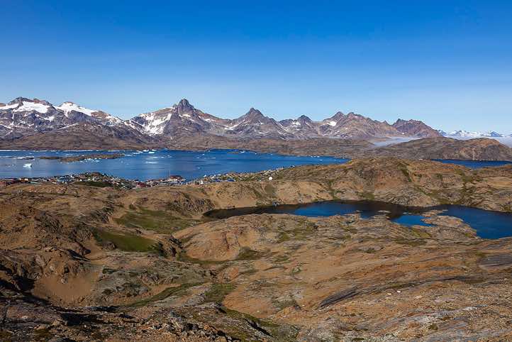 Tasiilaq and Tasiilaq Fjord, seen from the mountain slopes south of Tasiilaq, Ammassalik Island