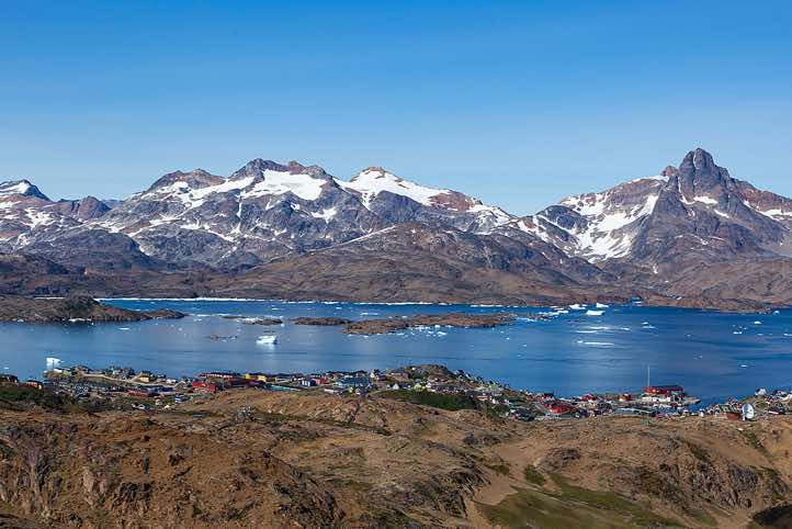 Tasiilaq and Tasiilaq Fjord, seen from the mountain slopes south of Tasiilaq, Ammassalik Island