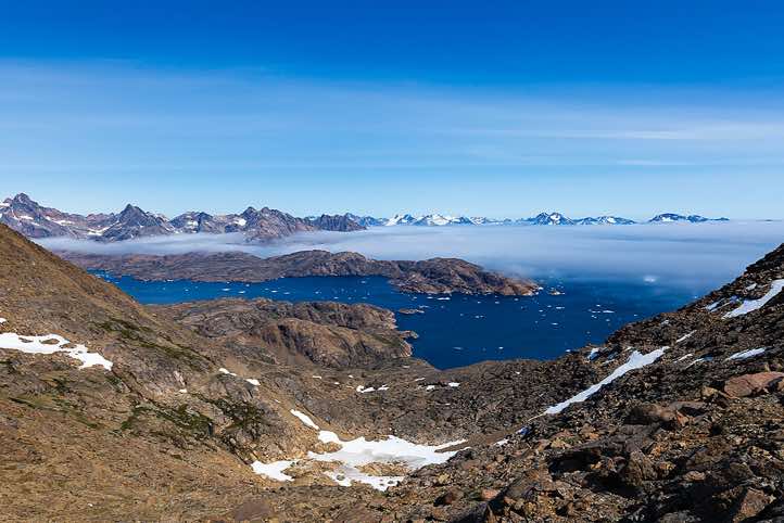 Tasiilaq Fjord and Ammassalik Fjord, seen from the slopes of Qaqqartivakajik (Qaqertivagajik) mountain, Tasiilaq, Ammassalik Island