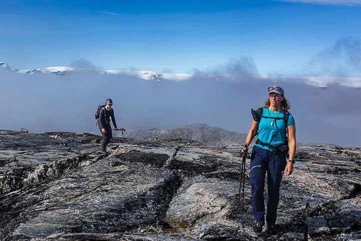Christine and Marijke approaching, Ficksbjerg ascent, Hundefjord (Amitsivartiva Fjord)
