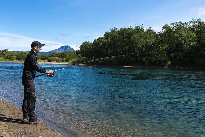 Janek fishes salmon in the Ozernaya River