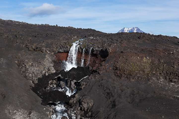 Waterfall at the foothills of Plosky Tolbachik volcano, Klyuchevskoy Nature Park