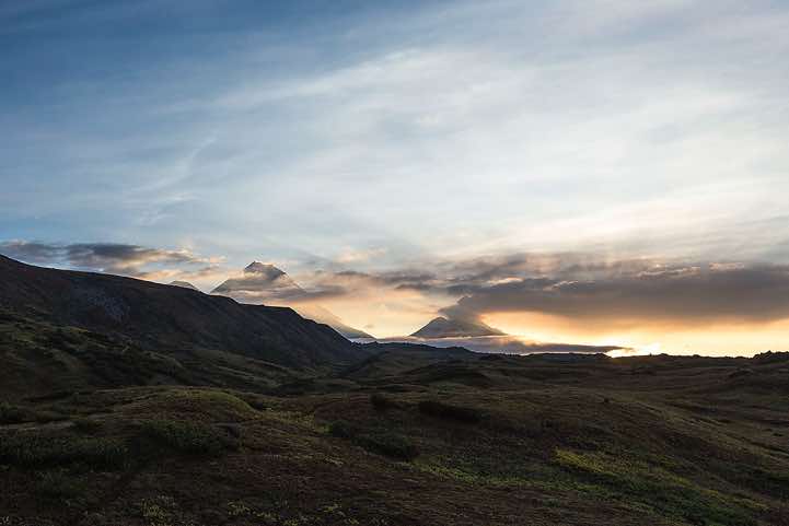 From left: Top of Klyuchevskaya Sopka (or Klyuchevskoy) volcano, 4850m, Kamen volcano, 4575m, and Bezymyannaya Sopka (or Bezymianny) volcano, 2882m, around Tolbachik trek, Klyuchevskoy Nature Park