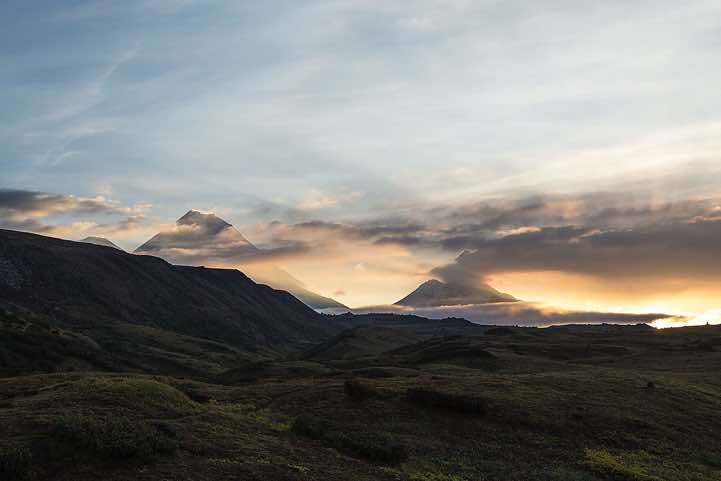 From left: Top of Klyuchevskaya Sopka (or Klyuchevskoy) volcano, 4850m, Kamen volcano, 4575m, and Bezymyannaya Sopka (or Bezymianny) volcano, 2882m, around Tolbachik trek, Klyuchevskoy Nature Park