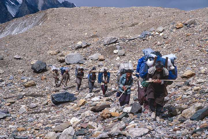 Group of porters on the Baltoro Glacier, Karakoram Mountains