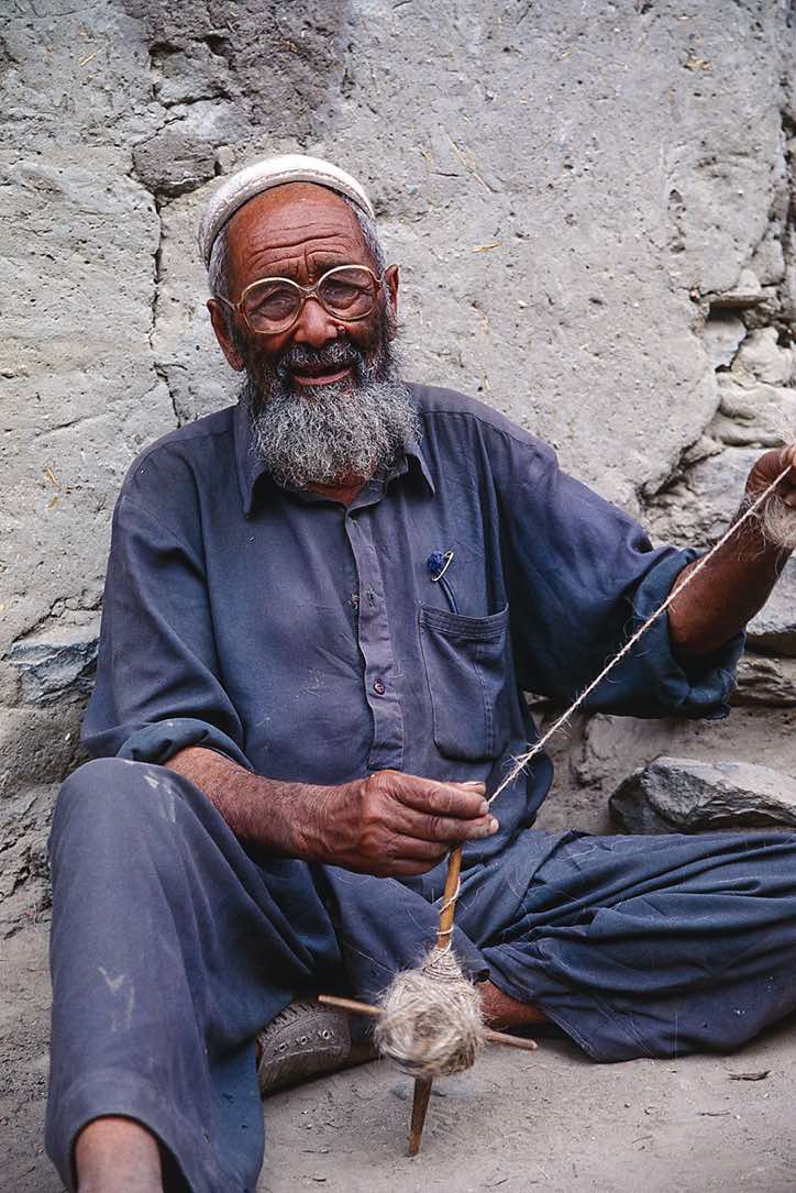 Man spinning wool, Hushe, Karakoram Mountains
