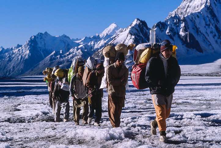 Group of porters on the Biafo Glacier, Karakoram Mountains