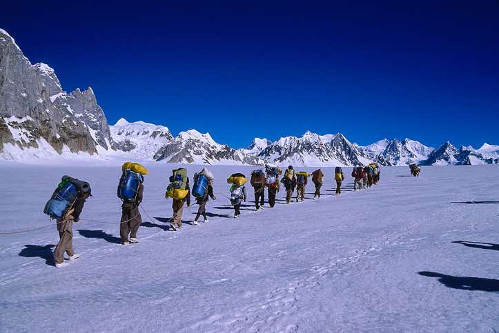 Group of porters on the Biafo Glacier, Karakoram Mountains