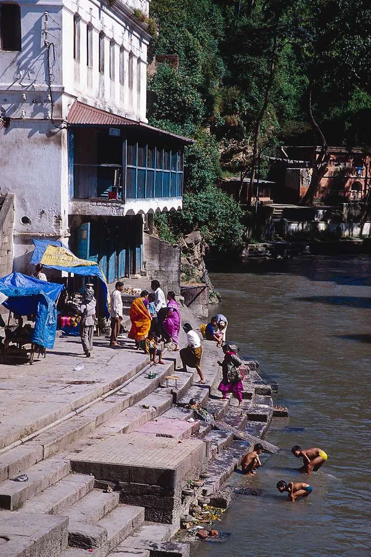 Pilgrims on the banks of the sacred Bagmati river, Pashupatinath