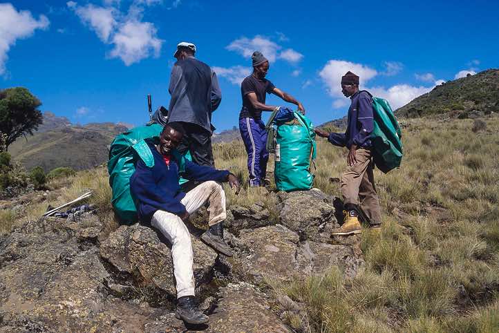 Group of porters taking a rest, Chogoria route