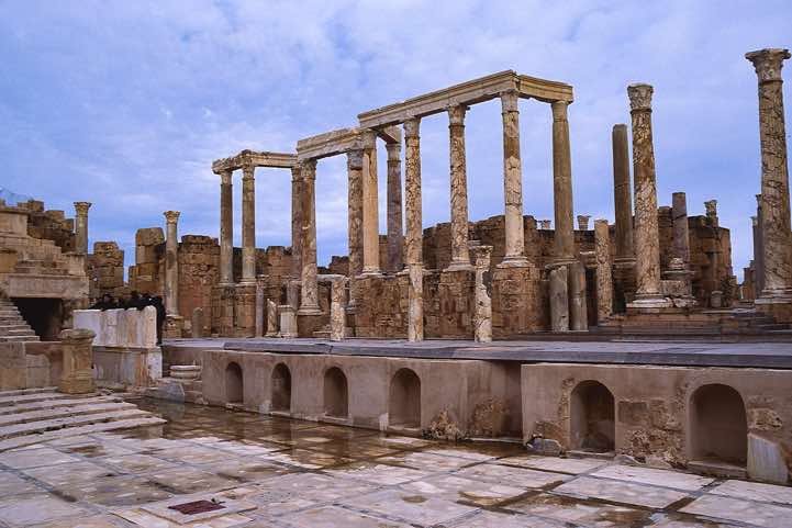 The theatre has a stage backdrop with a fine array of costly columns
