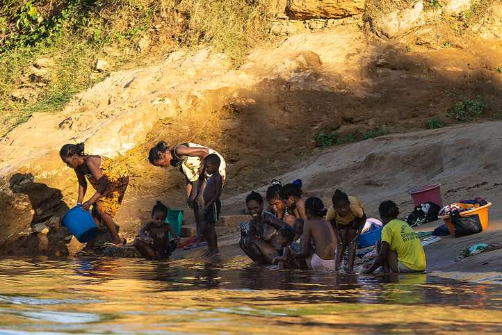 Women and children on the banks of the Tsiribihina River, Western Madagascar