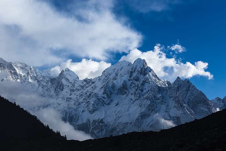 Mount Phungi, 6528m, in clouds, seen from Bimtang (Bimthang) village