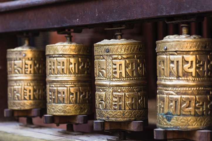 Prayer wheels in the Golden Temple, Patan