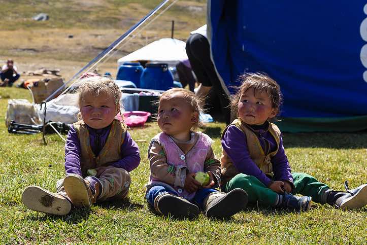Nomad kids at campsite, Tavan Bogd National Park, Altai Mountains, Western Mongolia