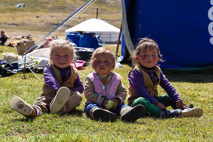 Nomad kids at campsite, Tavan Bogd National Park, Altai Mountains, Western Mongolia