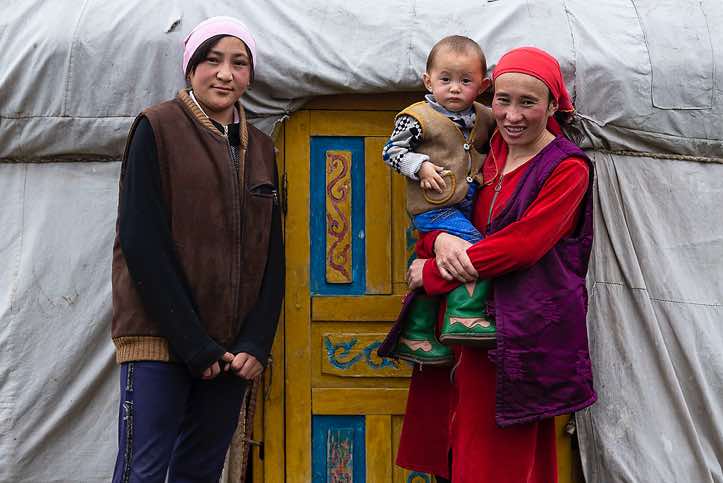 Nomads in front of their yurt, Tavan Bogd National Park, Altai Mountains, Western Mongolia